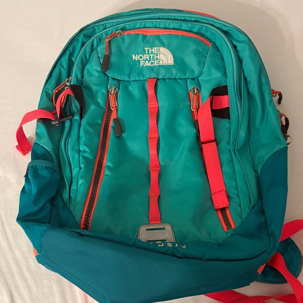 The North Face Turquoise and Orange Backpack - Surge II Transit